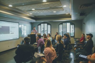 best laptops for students, people in classroom having a lecture