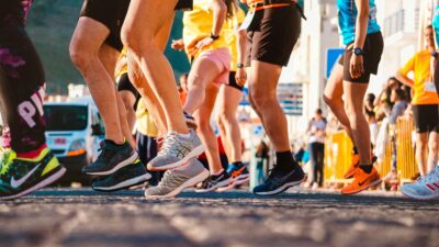 best shoes for running, runners, racers wearing running shoes on pavement