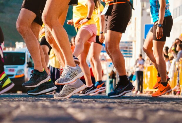 best shoes for running, runners, racers wearing running shoes on pavement