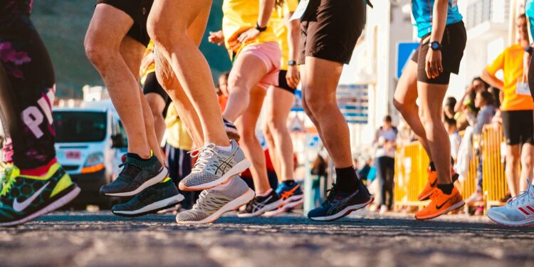 best shoes for running, runners, racers wearing running shoes on pavement