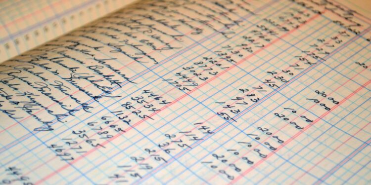 close up of ledger used to apply the golden rules of accounting