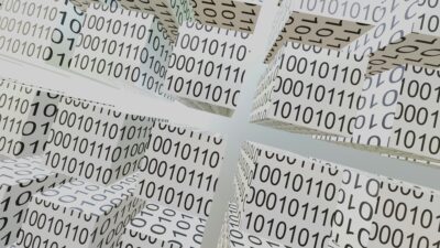 image of binary code blocks behind random number generator systems