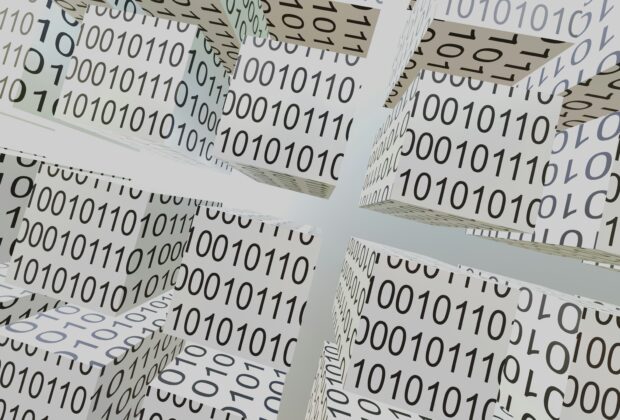 image of binary code blocks behind random number generator systems