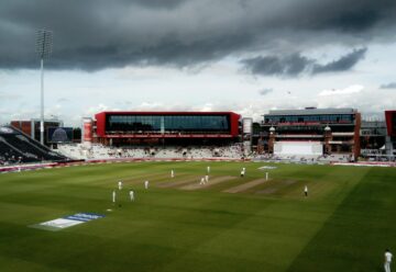 cricket stadium with live cricket score board display