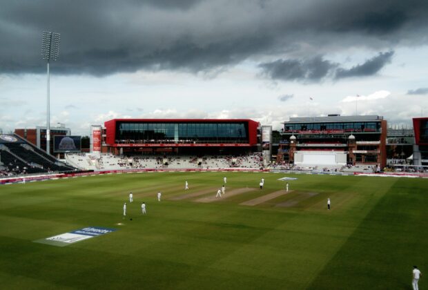cricket stadium with live cricket score board display