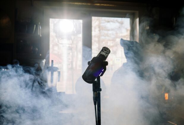 microphone with smoke behind it inspired by amy whinehouse and mark ronson working on back to black