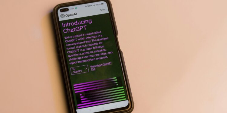 webpage of chatgpt a prototype ai natural language processing chatbot is seen on the website of openai on a smartphone examples capabilities and limitations are shown