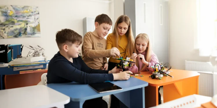 flipped classroom imagery with students in front of learning tools