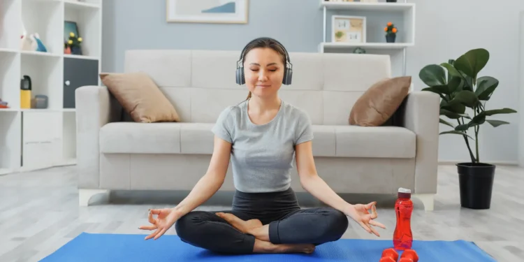 woman meditating as part of her mindfulness practices