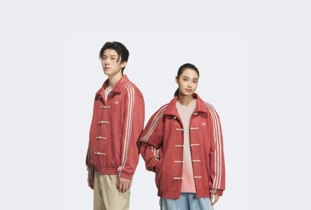 man and woman wearing Adidas Chinese New Year Jacket